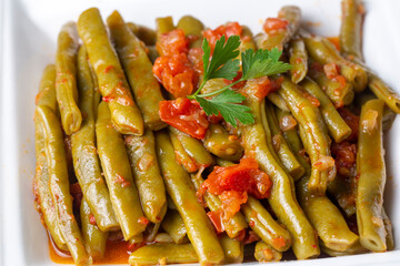 Traditional delicious Turkish food; Green beans with olive oil; Turkish name; Zeytinyagli taze fasulye