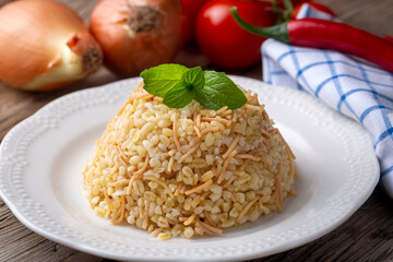 Traditional delicious Turkish food; Bulgur pilaf with vermicelli (Turkish name; sehriyeli bulgur pilaf)