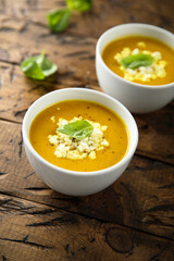 Healthy homemade pumpkin soup with cheese