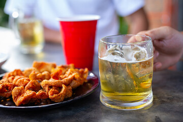 Beer party with friends at home, International Beer Day concept.
