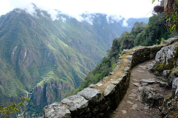 Fototapeta na wymiar Peru Machu Picchu - Hiking path to Machu Picchu ruins