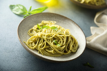 Traditional homemade pasta with pesto sauce	