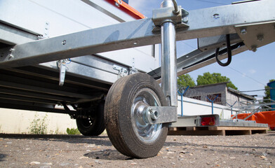 A store that sells trailers.Car open trailer. Transport for cargo transportation.
