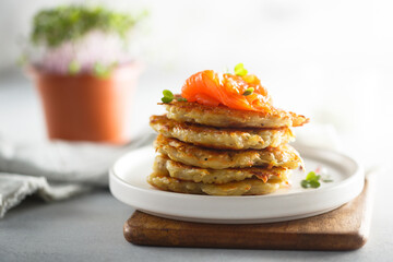 Homemade potato pancakes with smoked salmon