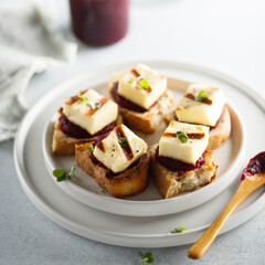 Grilled cheese with beetroot paste on toast