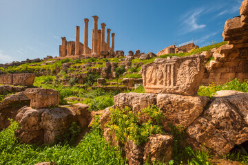  temple and stone ornament of column base on the ruins of the city of Jerash in Jordan