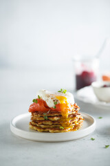 Traditional homemade potato pancakes with poached egg