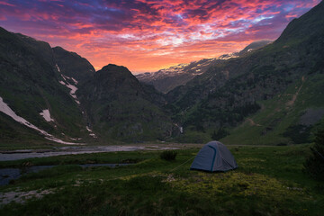 beautiful sunset in the mountain with tent, trekking, wild life