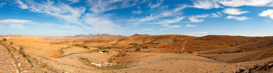 Fototapeta na wymiar Panorama of stony desert in the canary islands