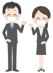 マスクを着けたスーツ姿の男女