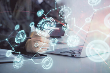 Multi exposure of woman on-line shopping holding a credit card and social network theme drawing. Relationship E-commerce concept.