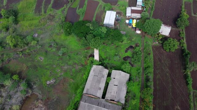 Aerial footage of rural monsoon landscape at Bhor near Pune India.