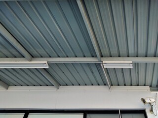 Surveillance cameras installed under the metal roof provide a sense of security.