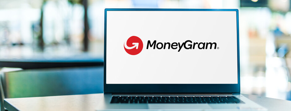 Laptop computer displaying logo of MoneyGram