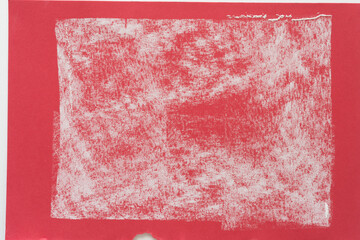 white chalk on red construction paper with torn edges