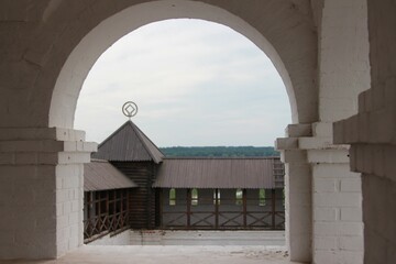view from the monastery wall tower to the UNESCO World Heritage Emblem