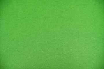 Green background. Antique. Suitable for backgrounds. The texture of the cardboard.