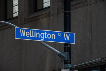 Wellington street west sign in downtown Toronto.