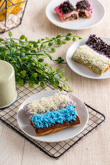 Piscok or banana chocolate is  traditional snacks from Indonesia. made of fried banana wrapped in spring roll skin and assorted melted 
toppings (Chocolate, Taro, Strawberry) 