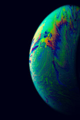 Globe light. Abstract galaxy background with planet earth in universe space with sunlight on dark background. Fantastic structure of colorful bubbles.