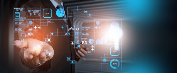 ERP, document management concept.Businessman working with laptop computer with icons on virtual...