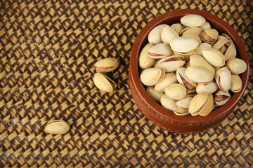 Top view of Pistachios in ceramic glass.