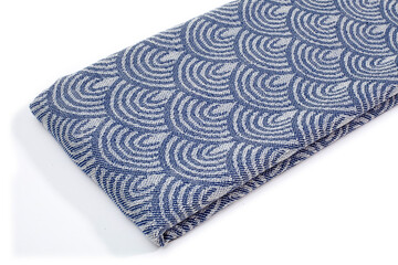 Blue Peshtemal Turkish towel folded colorful textile for spa, beach, pool, light travel, healthy fashion and gifts. Traditional turkish bath material, scarf