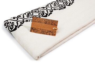 Peshtemal Turkish towel folded colorful textile for spa, beach, pool, light travel, healthy fashion and gifts. Traditional turkish bath material, handmade, beige and stone look