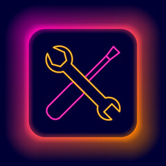 Glowing neon line Screwdriver and wrench spanner tools icon isolated on black background. Service tool symbol. Colorful outline concept. Vector