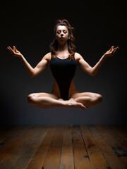 Photo of a woman in meditation. Levitation.