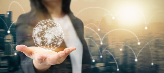 Global tech business and world economy investment communication concept by information network, internet connection, AI technology with businesswoman holding globe linkage with city office background