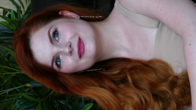 Close up of Womans Face, Woman opening her Beautiful blue azzure Eyes, Attractive Ginger.