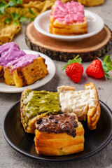 Roti Bakar Bandung or Bandung Bread Toast is Popular Street Food from Bandung. Roti bakar refers to toast, served often with butter, cheese, stwarberry jam, Green tea, crushed peanuts and sugar,
