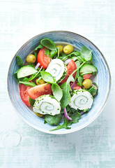 Summer Salad with Cream Cheese, green Olives, Tomatoes and fresh Basil. 