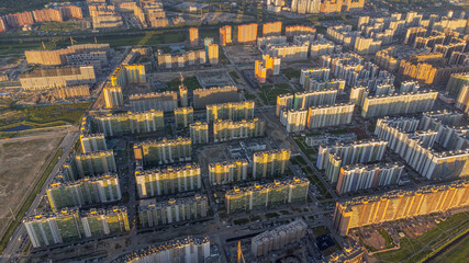city from a bird's-eye view against the sunset, at home