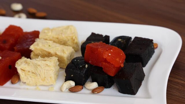 Kozhikodan Halwa , Bombay Halwa , soan papdi Indian sweet food mithai celebration special occasion Kerala India 4K video traditional Pakistani festival dessert Onam Diwali, Ramadan, Eid, Dusshera 