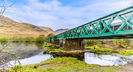 A view along the railway bridge at the northern end of Loch Awe, Scotland on a summers day