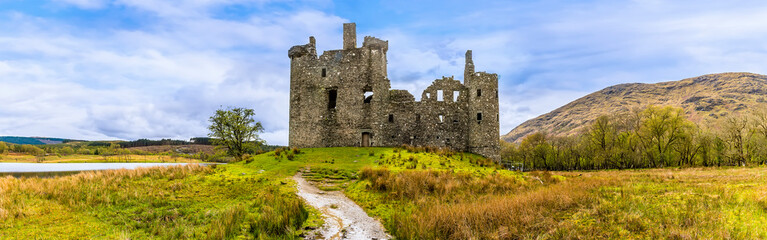 A panorama view of the northern end of Loch Awe and the ruins of the castle, Scotland on a summers day