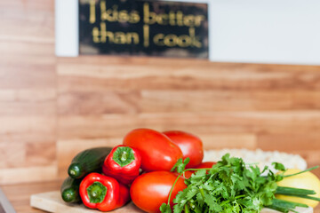 Cooking at home healthy tomatoes cucumber parsley