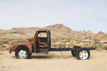 Abandoned vintage rusty pickup truck car wreck in the desert, Rhyolite, Death Valley National Park,...