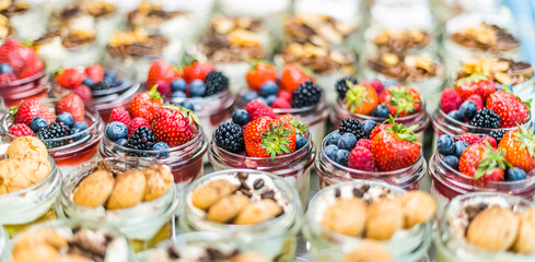 Assorted bio desserts presented in a cafe refrigerator