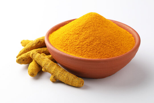 Indian spices, Turmeric powder or haldi powder Turmeric with roots 

