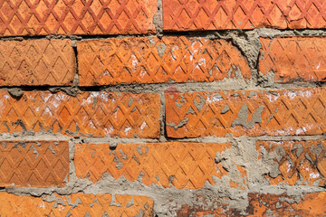 Orange brick wall fragment