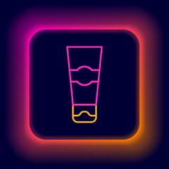 Glowing neon line Tube of toothpaste icon isolated on black background. Colorful outline concept. Vector