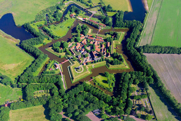 Aerial view from the drone of star-shaped Fort Bourtange, Groningen, The Netherlands - obrazy, fototapety, plakaty
