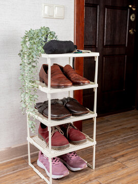 Shoe Rack In The Hallway Of The Apartment.