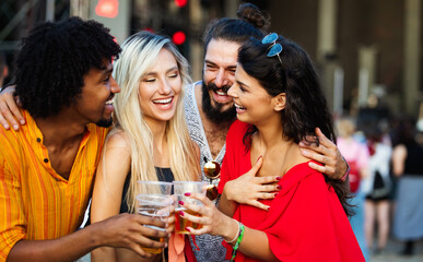 Group of friends having fun time at music festival
