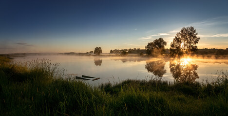 morning landscape with fog on the bank of the Ural river, Russia June