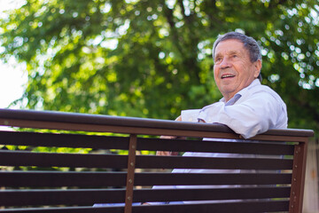 Fototapeta premium Senior man relaxing in the park