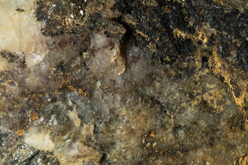 Raw mineral crystals close-up background.